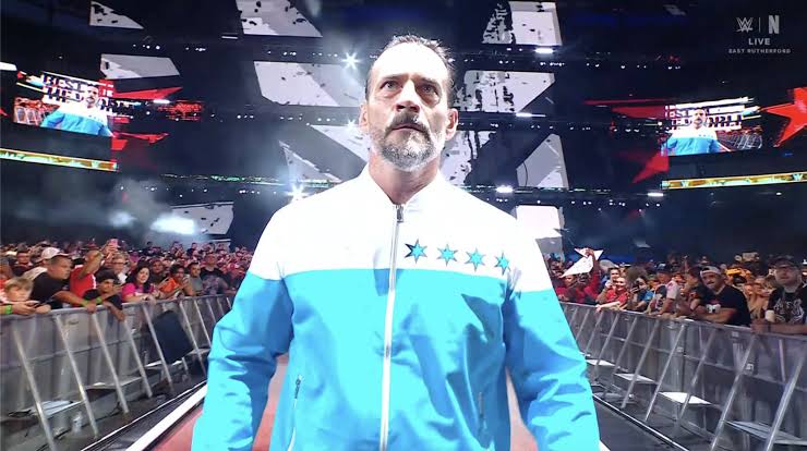 WWE SummerSlam 2025 में CM Punk का Fantastic Four जैकेट।