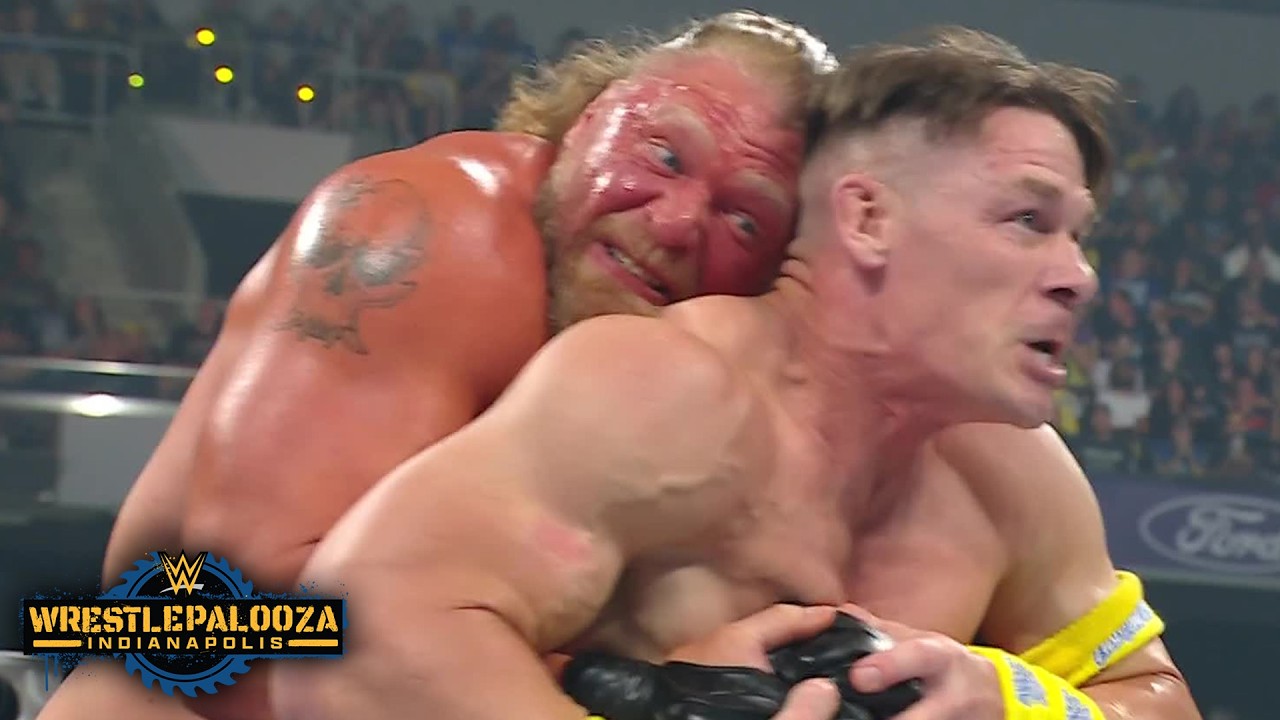 Brock Lesnar standing over a defeated John Cena at WWE WrestlePalooza.