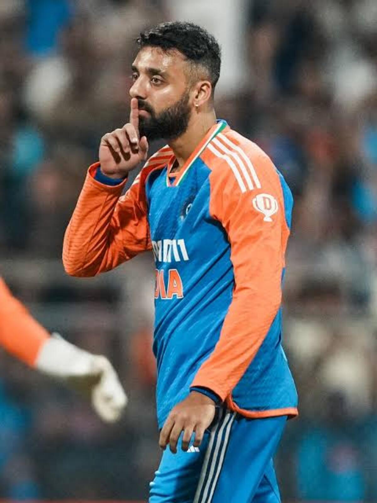 Varun Chakaravarthy celebrating a wicket after his comeback to the Indian cricket team.